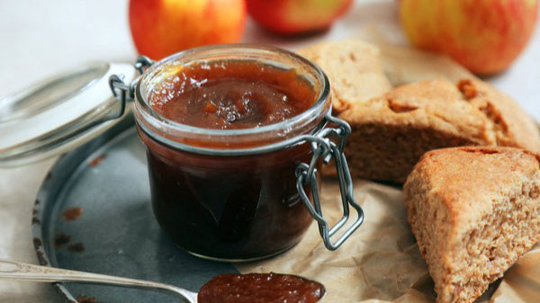 Apple butter is a highly concentrated form of apple sauce produced by long, slow cooking of apples with cider or water to a point where the sugar in t...